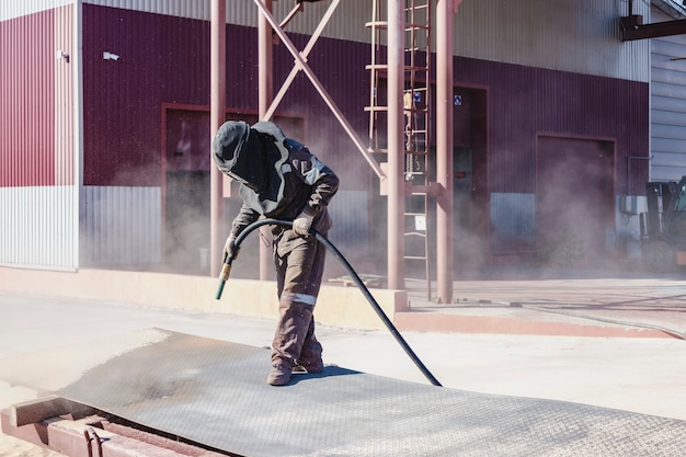 worker special suit is sandblasting metal industrial site 331695 2240